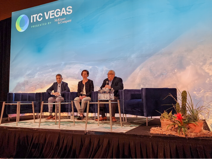Adam Garey, Jamie Kinsley, and James Carlucci sitting on stage for their panel discussion at ITC Vegas.